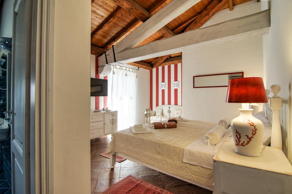 Domus Corallia-Luxury Rooms Porto Rotondo Habitación foto