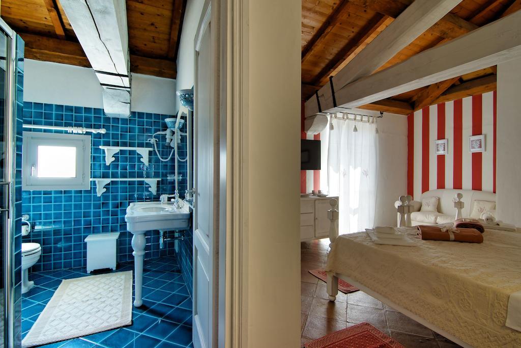 Domus Corallia-Luxury Rooms Porto Rotondo Habitación foto